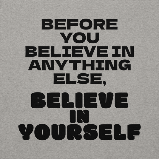 "Before you believe in anything else, believe in yourself" printed on a carbon grey background