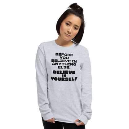 "Before you believe in anything else, believe in yourself" printed on a sport grey men's long sleeve shirt worn by a female