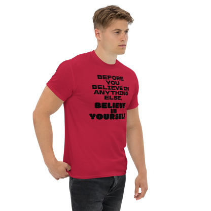 "Before you believe in anything else, believe in yourself" printed on a cardinal unisex classic tee worn by a male