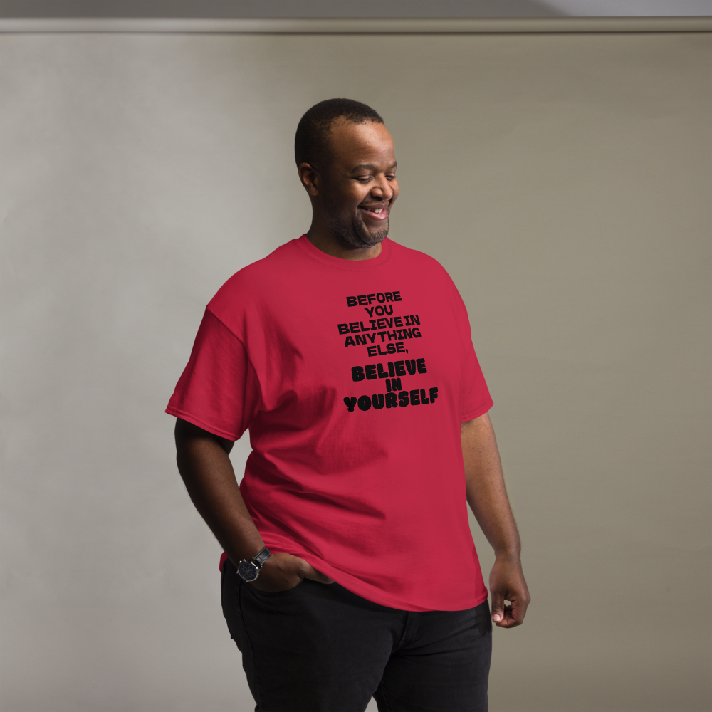 "Before you believe in anything else, believe in yourself" printed on a cardinal unisex classic tee worn by a male