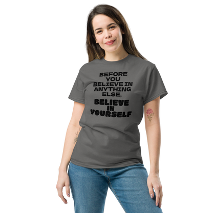 "Before you believe in anything else, believe in yourself" printed on a charcoal unisex classic tee worn by a female