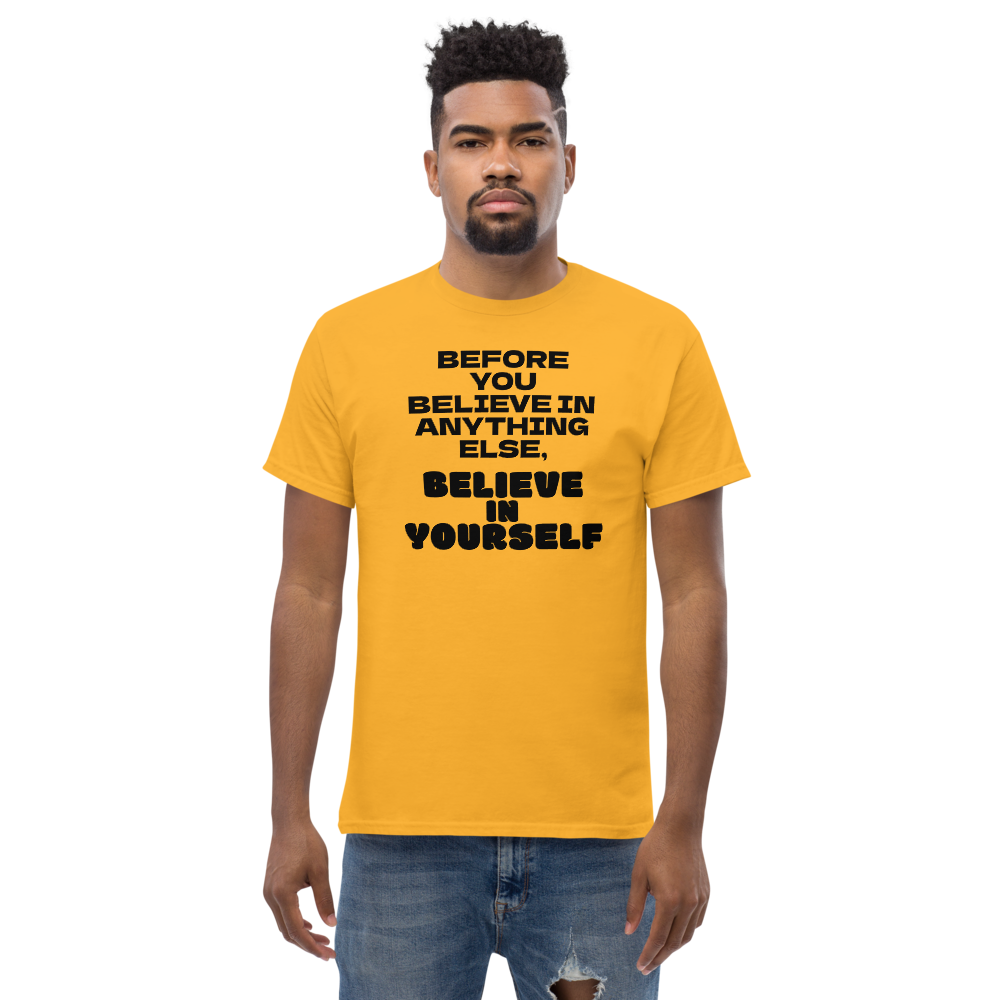 "Before you believe in anything else, believe in yourself" printed on a gold unisex classic tee worn by a male