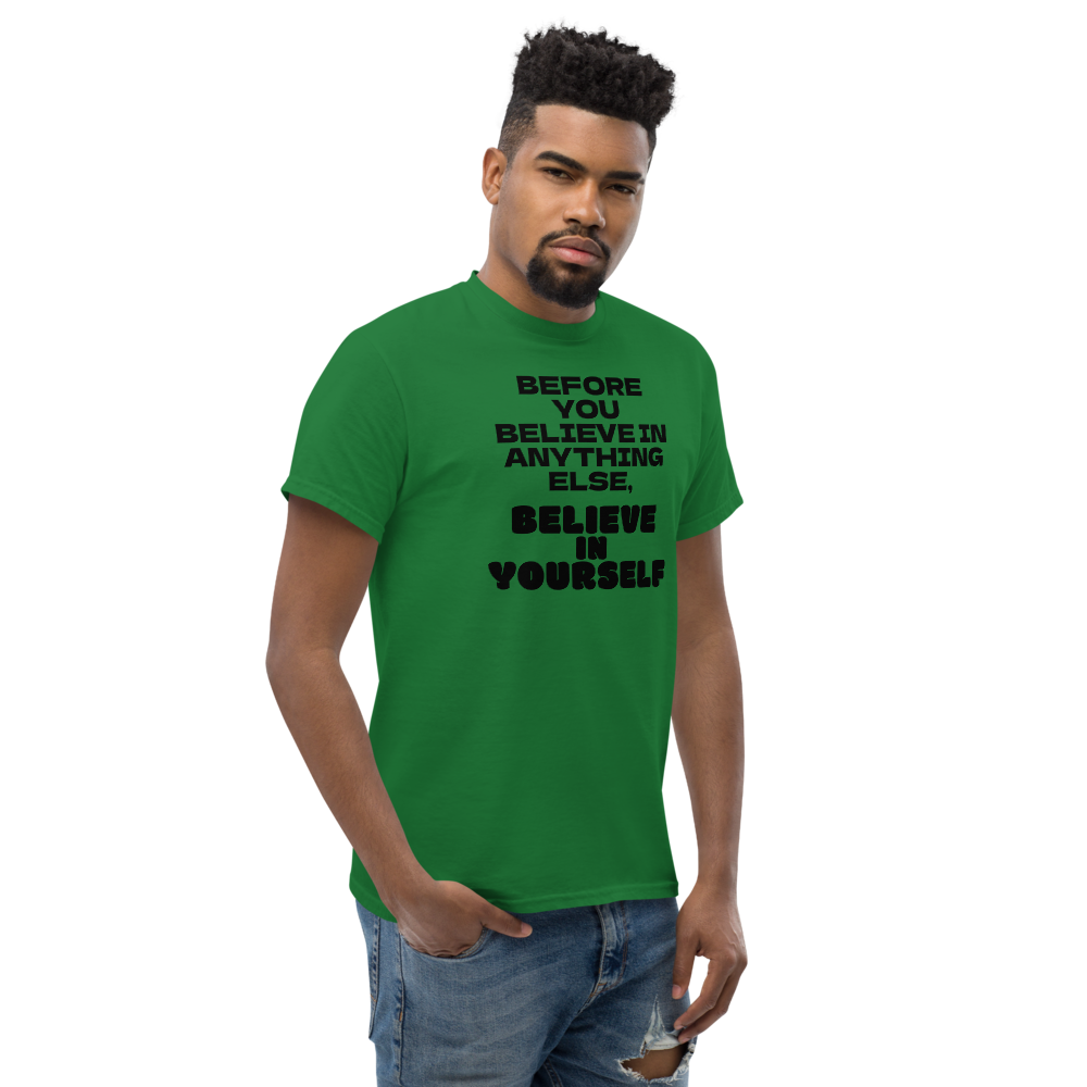 "Before you believe in anything else, believe in yourself" printed on a turf green unisex classic tee worn by a male