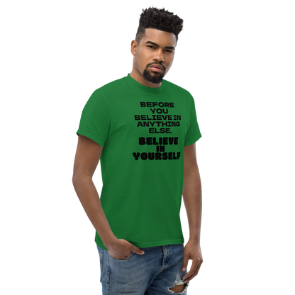 "Before you believe in anything else, believe in yourself" printed on a turf green unisex classic tee worn by a male