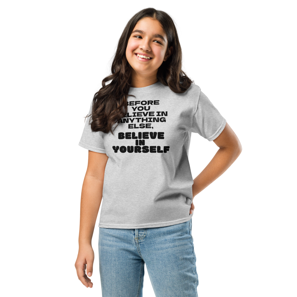 "Before you believe in anything else, believe in yourself" printed on a sport grey youth classic tee worn by a female