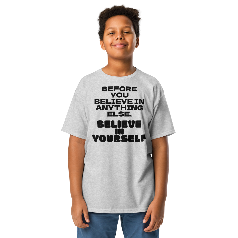 "Before you believe in anything else, believe in yourself" printed on a sport grey youth classic tee worn by a male