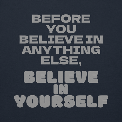 "Before you believe in anything else, believe in yourself" printed on a navy blazer background