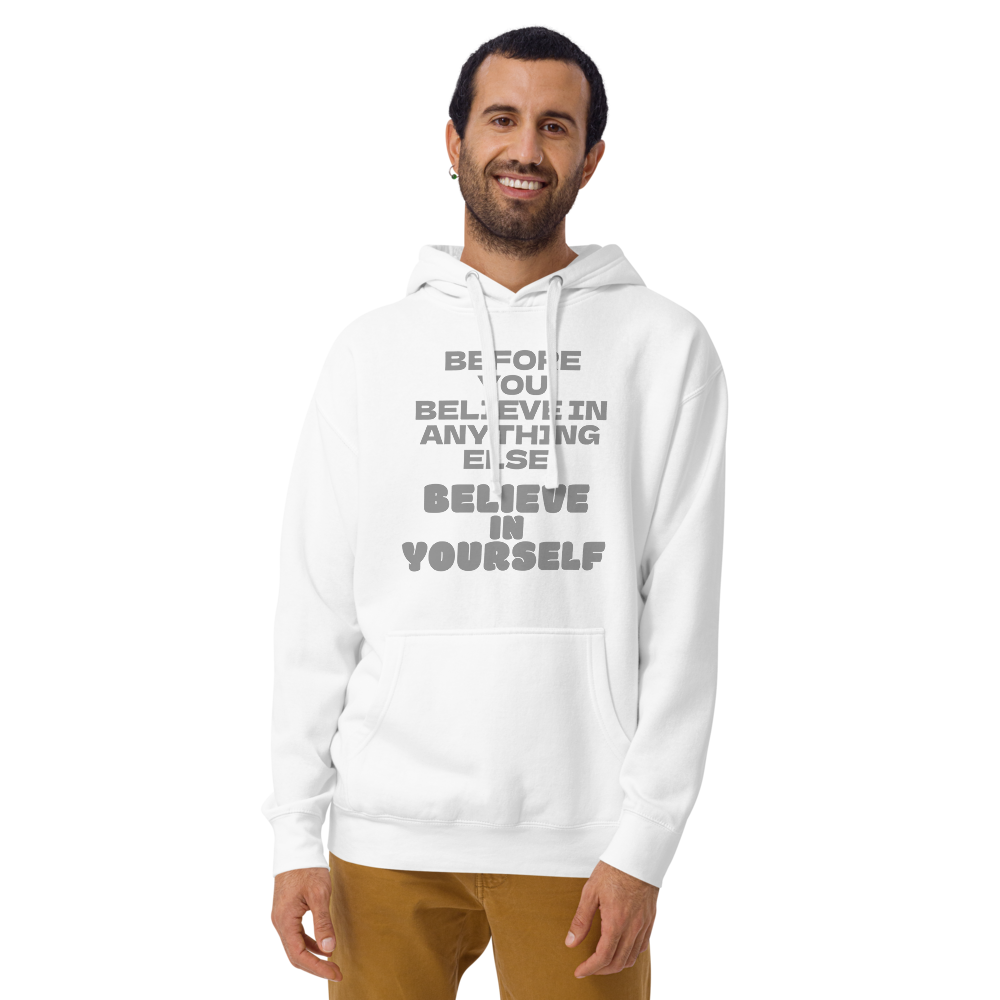 "Before you believe in anything else, believe in yourself" printed on a white warn by a male