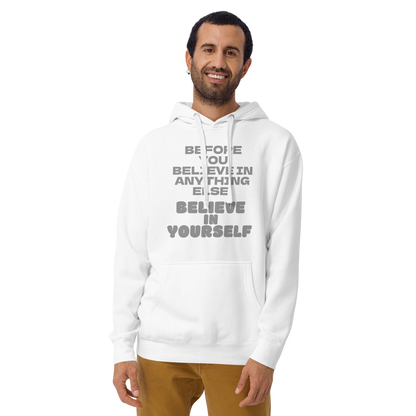"Before you believe in anything else, believe in yourself" printed on a white warn by a male