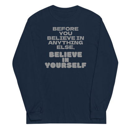 "Before you believe in anything else, believe in yourself" printed on a navy men's long sleeve shirt laying on a flat surface