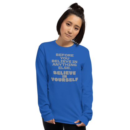 "Before you believe in anything else, believe in yourself" printed on a royal men's long sleeve shirt worn by a female