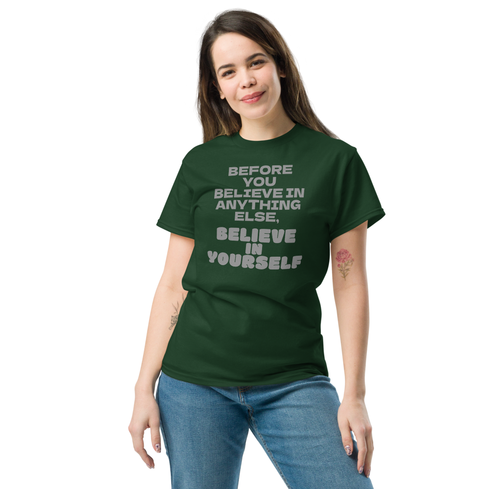 "Before you believe in anything else, believe in yourself" printed on a forest green unisex classic tee worn by a female