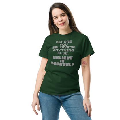 "Before you believe in anything else, believe in yourself" printed on a forest green unisex classic tee worn by a female