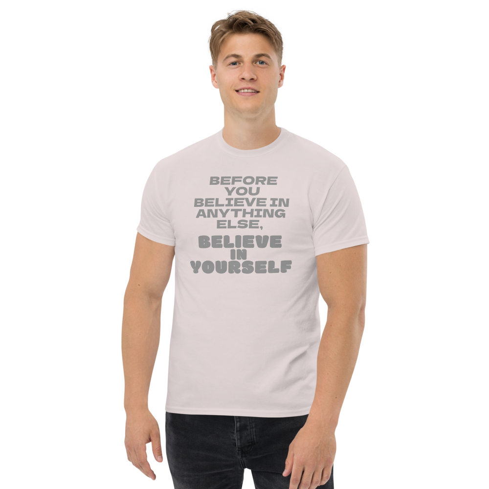 "Before you believe in anything else, believe in yourself" printed on a ice grey unisex classic tee worn by a male