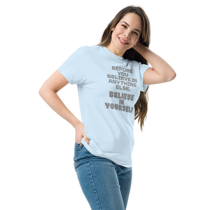"Before you believe in anything else, believe in yourself" printed on a light blue unisex classic tee worn by a female