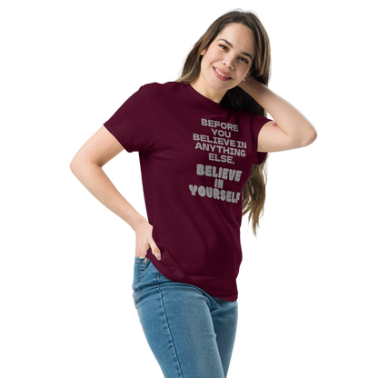 "Before you believe in anything else, believe in yourself" printed on a maroon unisex classic tee worn by a female