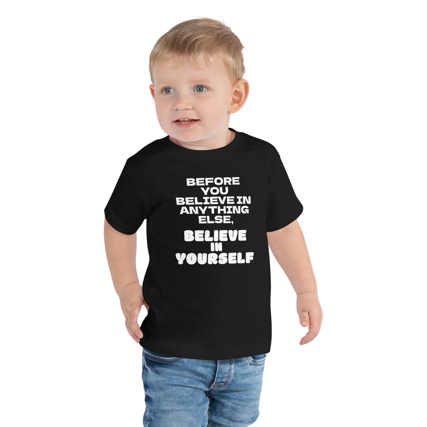 "Before you believe in anything else, believe in yourself" printed on a black toddler short sleeve tee worn by a male