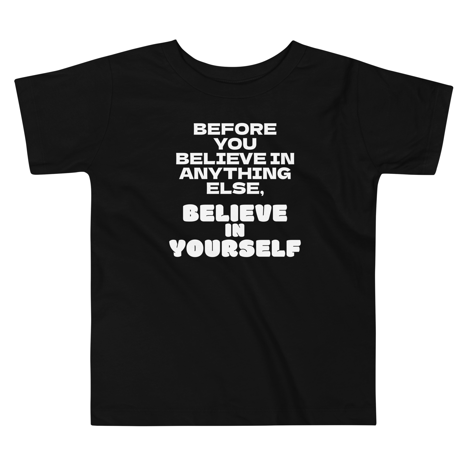 "Before you believe in anything else, believe in yourself" printed on a black toddler short sleeve tee laying on a flat surface