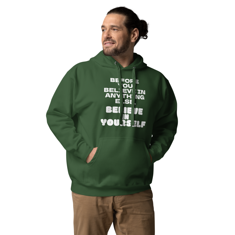 "Before you believe in anything else, believe in yourself" printed on a forest green unisex hoodie worn by a male