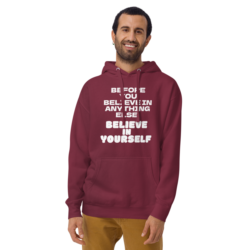 "Before you believe in anything else, believe in yourself" printed on a maroon warn by a male