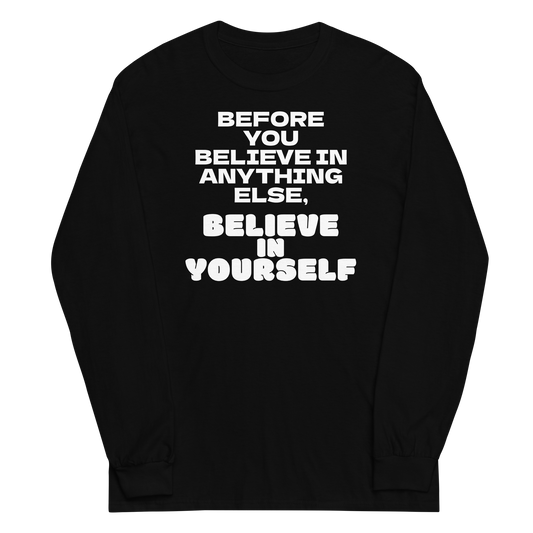 "Before you believe in anything else, believe in yourself" printed on a black men's long sleeve shirt laying on a flat surface