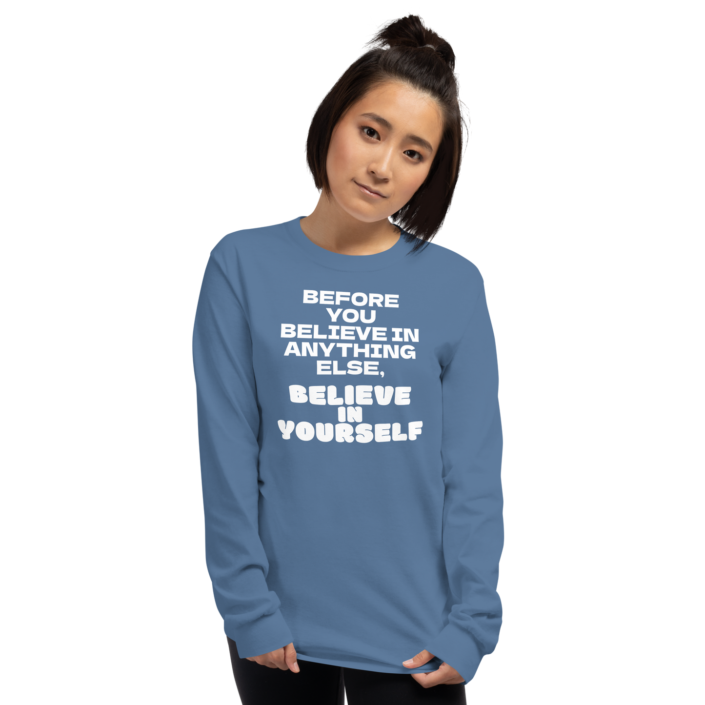 "Before you believe in anything else, believe in yourself" printed on a indigo blue men's long sleeve shirt worn by a female