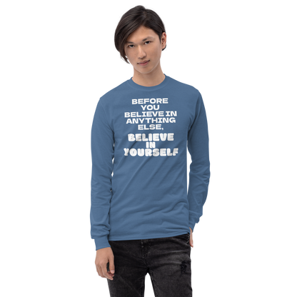 "Before you believe in anything else, believe in yourself" printed on a indigo blue men's long sleeve shirt worn by a male