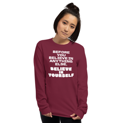 "Before you believe in anything else, believe in yourself" printed on a maroon men's long sleeve shirt worn by a female