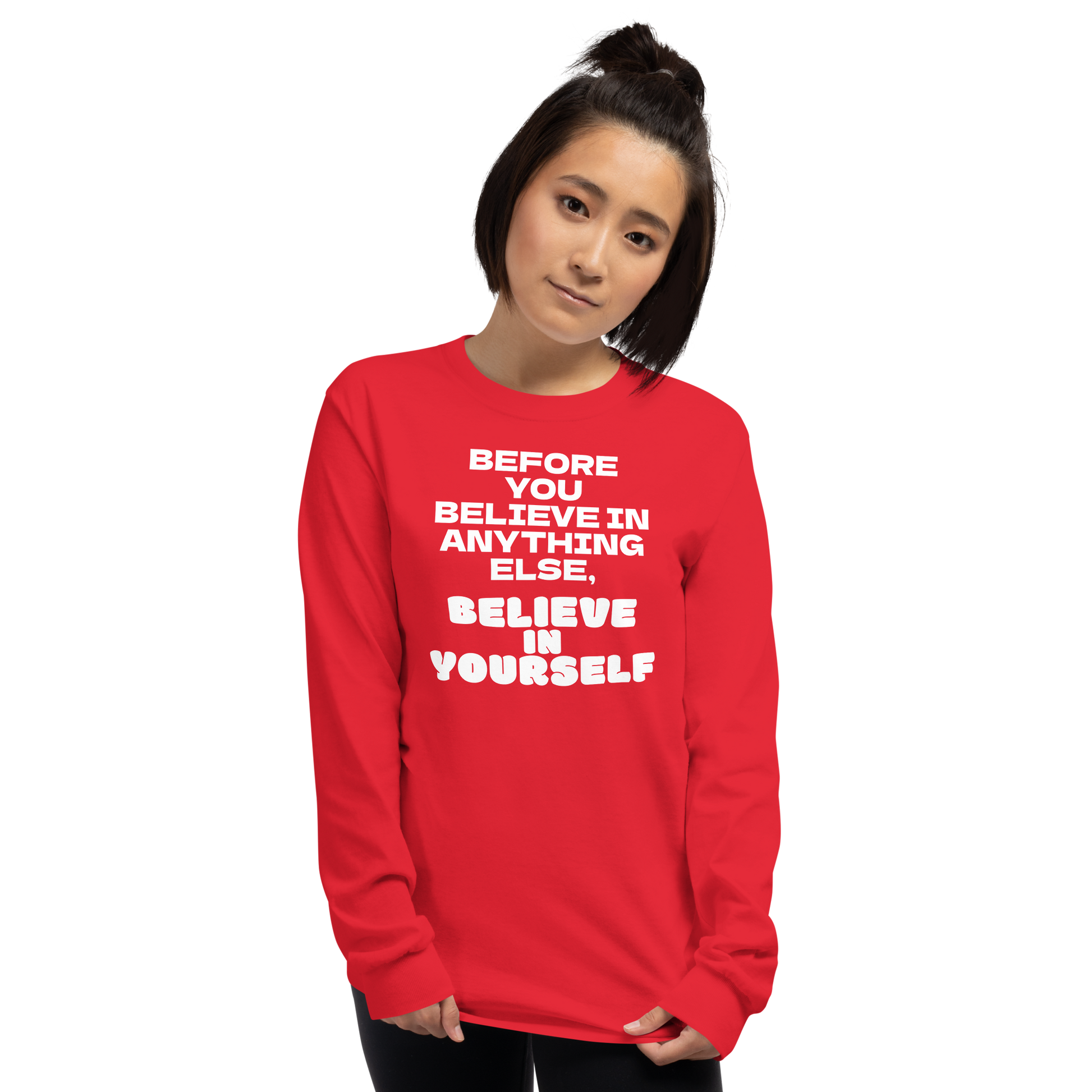 "Before you believe in anything else, believe in yourself" printed on a red men's long sleeve shirt worn by a female