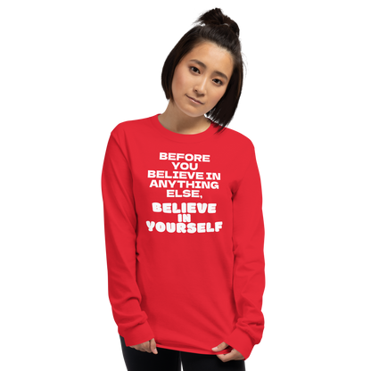 "Before you believe in anything else, believe in yourself" printed on a red men's long sleeve shirt worn by a female