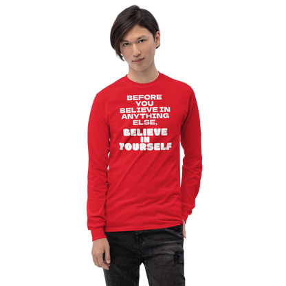"Before you believe in anything else, believe in yourself" printed on a red men's long sleeve shirt worn by a male
