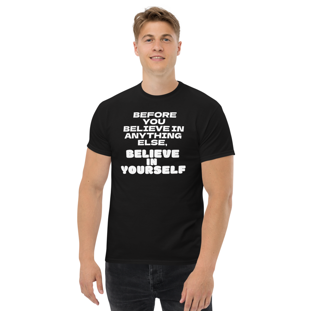 "Before you believe in anything else, believe in yourself" printed on a black unisex classic tee worn by a male