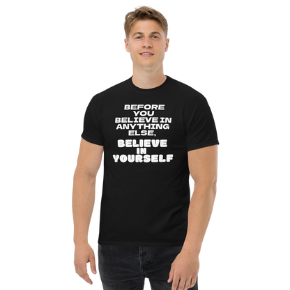 "Before you believe in anything else, believe in yourself" printed on a black unisex classic tee worn by a male