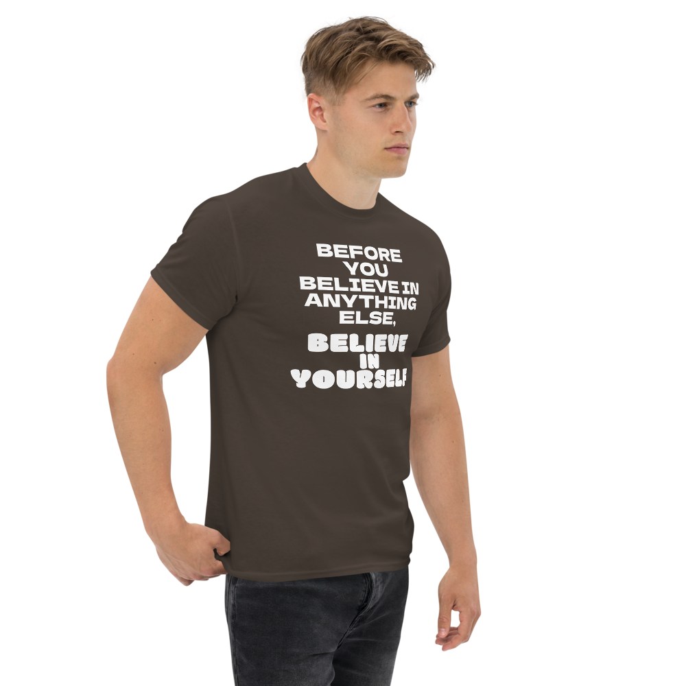 "Before you believe in anything else, believe in yourself" printed on a dark chocolate unisex classic tee worn by a male