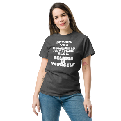 "Before you believe in anything else, believe in yourself" printed on a dark heather unisex classic tee worn by a female