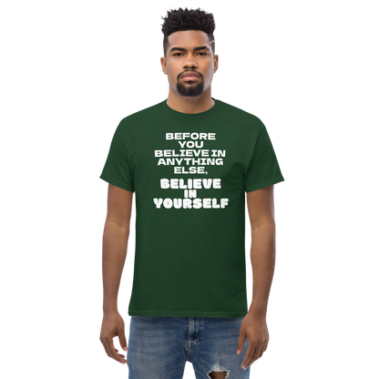 "Before you believe in anything else, believe in yourself" printed on a forest green unisex classic tee worn by a male