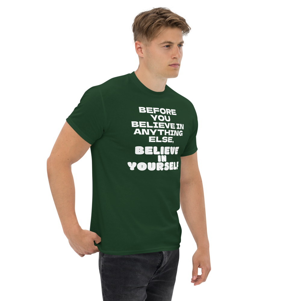 "Before you believe in anything else, believe in yourself" printed on a forest green unisex classic tee worn by a male