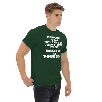 "Before you believe in anything else, believe in yourself" printed on a forest green unisex classic tee worn by a male