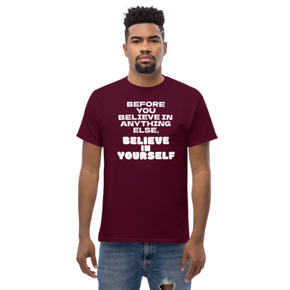 "Before you believe in anything else, believe in yourself" printed on a maroon unisex classic tee worn by a male