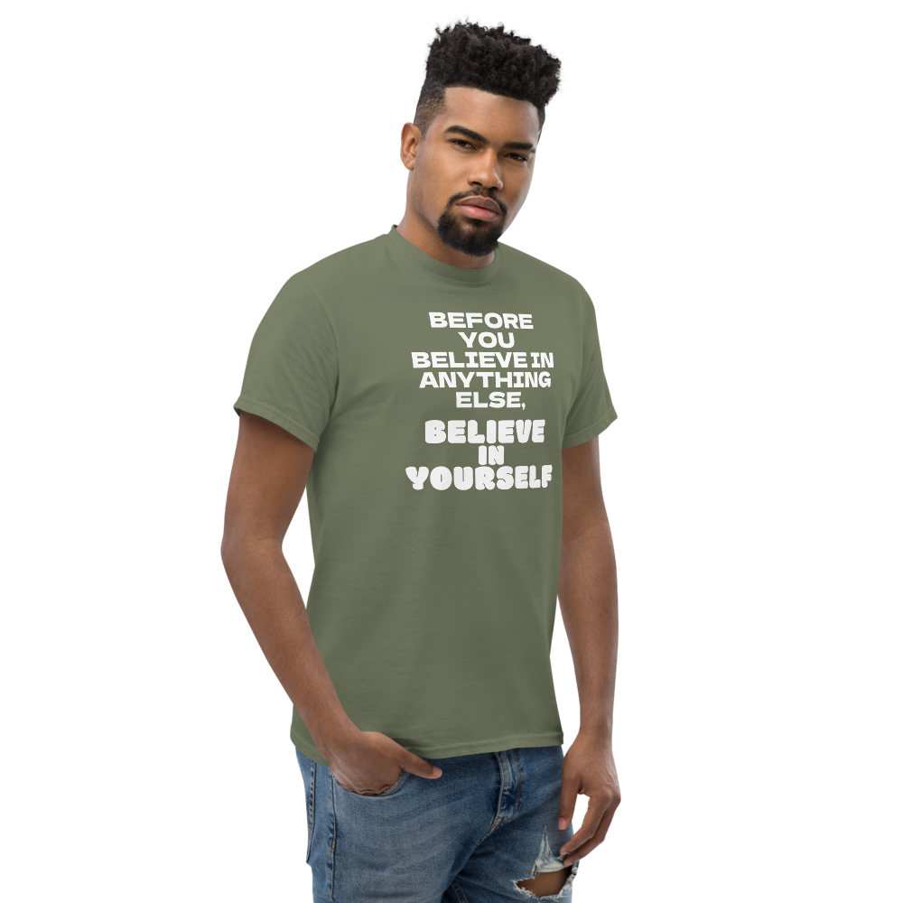 "Before you believe in anything else, believe in yourself" printed on a military green unisex classic tee worn by a male