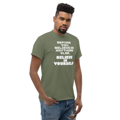 "Before you believe in anything else, believe in yourself" printed on a military green unisex classic tee worn by a male
