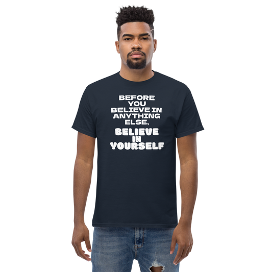 "Before you believe in anything else, believe in yourself" printed on a navy unisex classic tee worn by a male