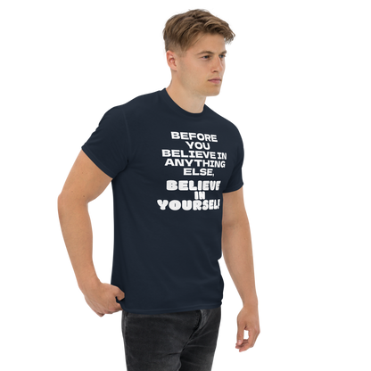 "Before you believe in anything else, believe in yourself" printed on a navy unisex classic tee worn by a male