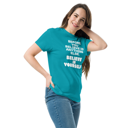 "Before you believe in anything else, believe in yourself" printed on a tropical blue unisex classic tee worn by a female
