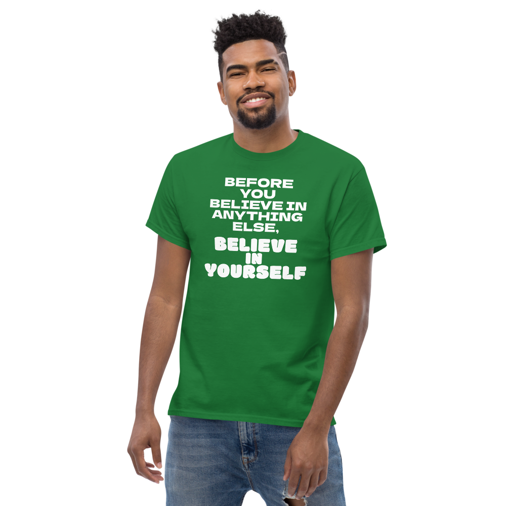 "Before you believe in anything else, believe in yourself" printed on a turf green unisex classic tee worn by a male