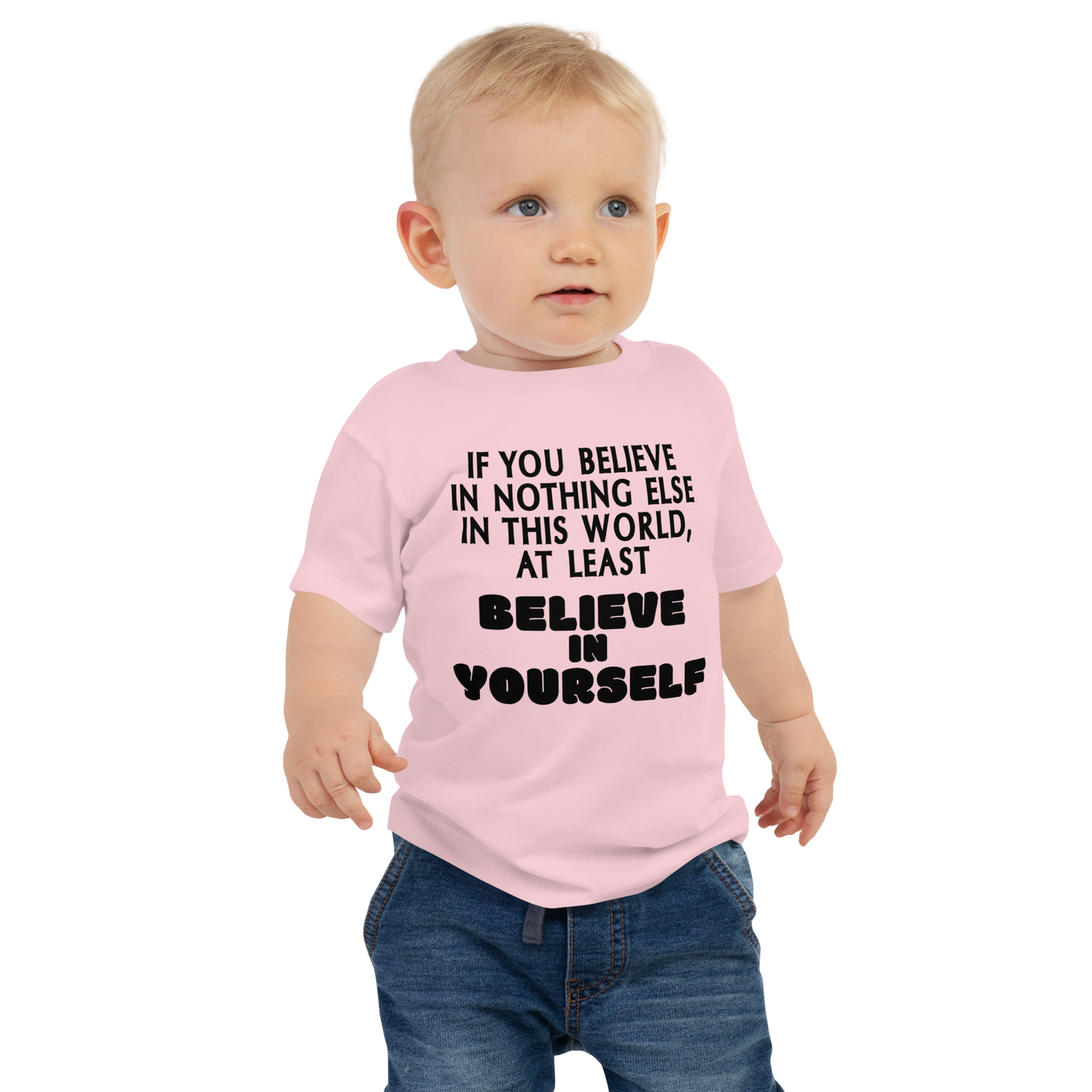 "If you believe in nothing else in this world, at least believe in yourself" printed on a pink baby jersey short sleeve tee worn by a male