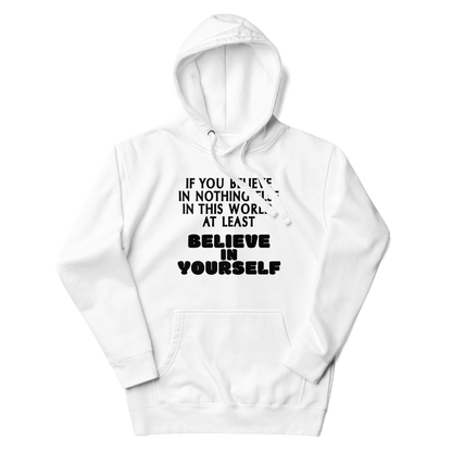 "If you believe in nothing else in this world, at least believe in yourself" printed on a white unisex hoodie laying on a flat surface with the hood up