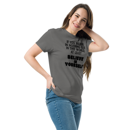 "If you believe in nothing else in this world, at least believe in yourself" printed on a charcoal unisex classic tee worn by a female