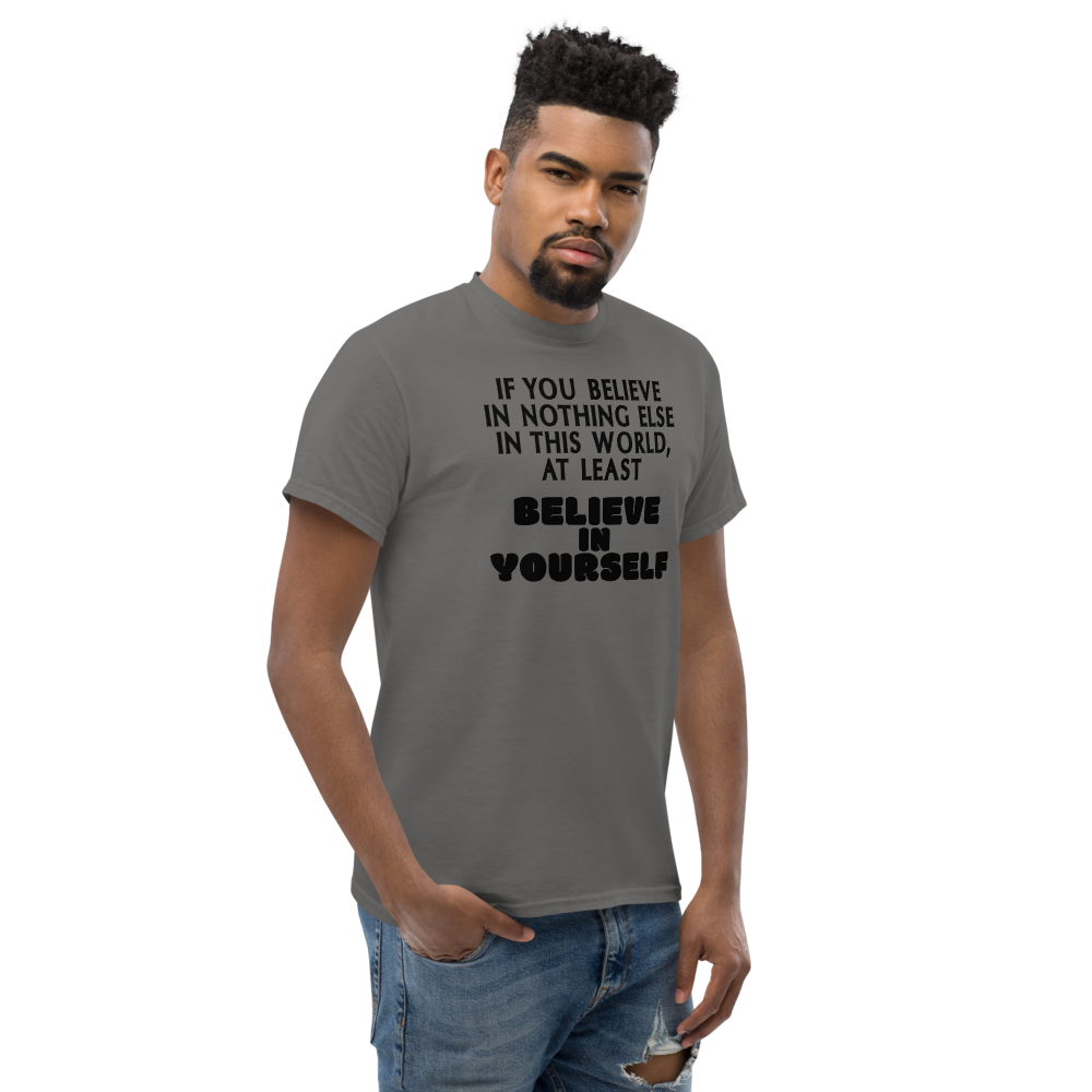 "If you believe in nothing else in this world, at least believe in yourself" printed on a charcoal unisex classic tee worn by a male