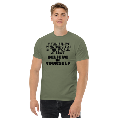 "If you believe in nothing else in this world, at least believe in yourself" printed on a military green unisex classic tee worn by a male